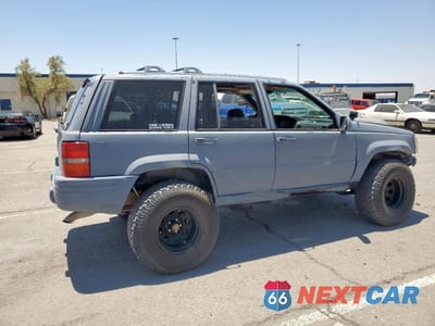 Trzecie zdjęcie samochodu z tyłu: 1997 JEEP GRAND CHEROKEE LIMITED VIN:1J4GZ78Y2VC746716 - miniatura