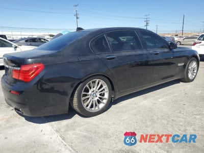 Trzecie zdjęcie samochodu z tyłu: 2012 BMW 750 LI VIN:WBAKB8C58CC963205 - miniatura