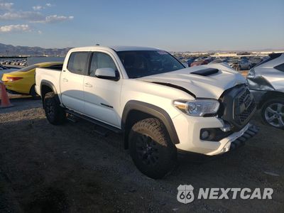 Czwarte zdjęcie samochodu z boku: 2023 TOYOTA TACOMA DOUBLE CAB VIN:3TYAZ5CN5PT037636 - miniatura