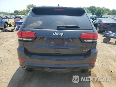 Zdjęcie 6 z 13 samochodu: 2014 JEEP GRAND CHEROKEE SRT-8 VIN:1C4RJFDJ4EC583656 - miniatura