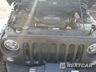 Zdjęcie 12 z 15 samochodu: 2014 JEEP WRANGLER UNLIMITED SAHARA VIN:1C4HJWEG9EL240338 - miniatura