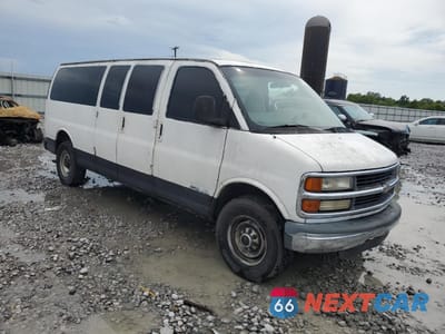 Czwarte zdjęcie samochodu z boku: 2000 CHEVROLET EXPRESS G3500 VIN:1GAHG39RXY1256579 - miniatura