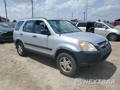 Czwarte zdjęcie samochodu z boku: 2002 HONDA CR-V LX VIN:SHSRD78493U112581 - miniatura