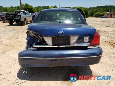 Zdjęcie 6 z 14 samochodu: 2004 FORD CROWN VICTORIA POLICE INTERCEPTOR VIN:2FAFP71WX4X175595 - miniatura