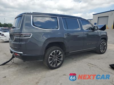 Trzecie zdjęcie samochodu z tyłu: 2022 JEEP GRAND WAGONEER SERIES III VIN:1C4SJVGJ0NS101584 - miniatura