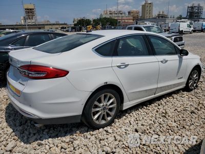 Trzecie zdjęcie samochodu z tyłu: 2017 FORD FUSION SE HYBRID VIN:3FA6P0LUXHR409418 - miniatura