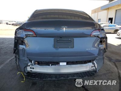 Zdjęcie 6 z 15 samochodu: 2022 TESLA MODEL Y VIN:7SAYGDEE4NF558374 - miniatura