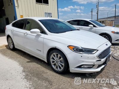 Czwarte zdjęcie samochodu z boku: 2017 FORD FUSION SE HYBRID VIN:3FA6P0LU1HR408996 - miniatura