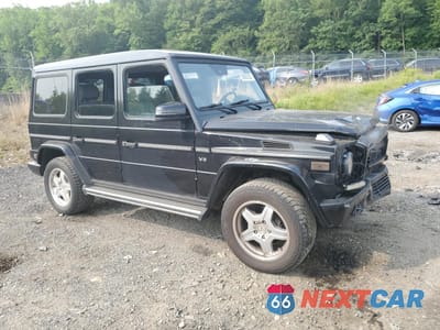 Czwarte zdjęcie samochodu z boku: 2003 MERCEDES-BENZ G 500 VIN:WDCYR49E83X135263 - miniatura