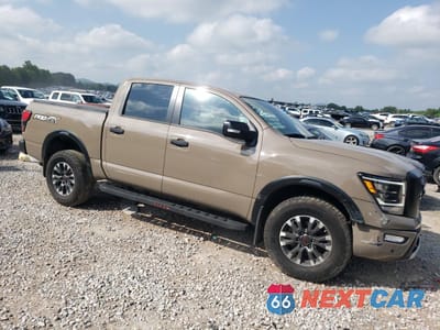 Czwarte zdjęcie samochodu z boku: 2024 NISSAN TITAN PRO-4X VIN:1N6AA1ED0RN116542 - miniatura
