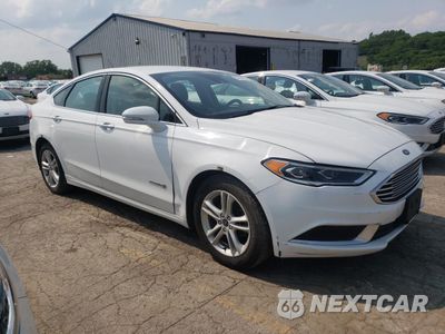 Czwarte zdjęcie samochodu z boku: 2018 FORD FUSION SE HYBRID VIN:3FA6P0LU2JR118725 - miniatura