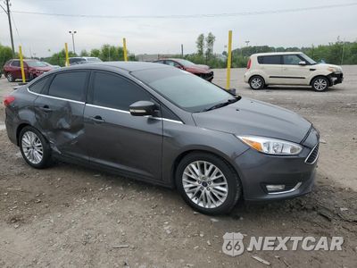 Czwarte zdjęcie samochodu z boku: 2015 FORD FOCUS TITANIUM VIN:1FADP3J27FL259029 - miniatura
