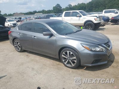 Czwarte zdjęcie samochodu z boku: 2016 NISSAN ALTIMA 2.5 VIN:1N4AL3AP1GC179446 - miniatura