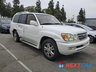 Czwarte zdjęcie samochodu z boku: 2003 LEXUS LX 470 VIN:JTJHT00WX33534413 - miniatura