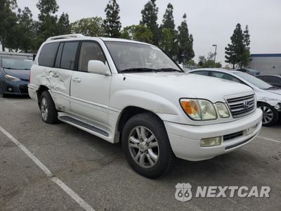 Czwarte zdjęcie samochodu z boku: 2003 LEXUS LX 470 VIN:JTJHT00WX33534413 - miniatura