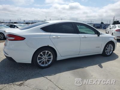 Trzecie zdjęcie samochodu z tyłu: 2019 FORD FUSION SE VIN:3FA6P0LU8KR263950 - miniatura