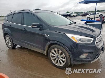 Czwarte zdjęcie samochodu z boku: 2017 FORD ESCAPE TITANIUM VIN:1FMCU0JDXHUD27928 - miniatura
