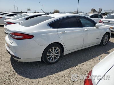 Trzecie zdjęcie samochodu z tyłu: 2017 FORD FUSION SE HYBRID VIN:3FA6P0LU5HR409164 - miniatura
