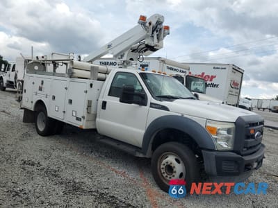 Czwarte zdjęcie samochodu z boku: 2015 FORD F450 SUPER DUTY VIN:1FDUF4GY7FEC93406 - miniatura