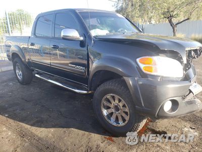 Czwarte zdjęcie samochodu z boku: 2004 TOYOTA TUNDRA DOUBLE CAB SR5 VIN:5TBET34134S436855 - miniatura