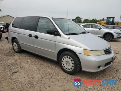 Czwarte zdjęcie samochodu z boku: 2002 HONDA ODYSSEY LX VIN:2HKRL18502H546808 - miniatura
