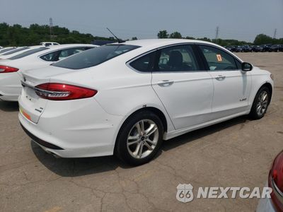 Trzecie zdjęcie samochodu z tyłu: 2018 FORD FUSION SE HYBRID VIN:3FA6P0LU0JR172069 - miniatura