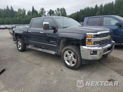 Czwarte zdjęcie samochodu z boku: 2016 CHEVROLET SILVERADO K2500 HEAVY DUTY LTZ VIN:1GC1KWE88GF262601 - miniatura