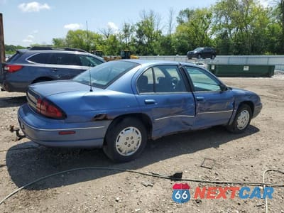 Trzecie zdjęcie samochodu z tyłu: 1999 CHEVROLET LUMINA BASE VIN:2G1WL52M0X1101254 - miniatura