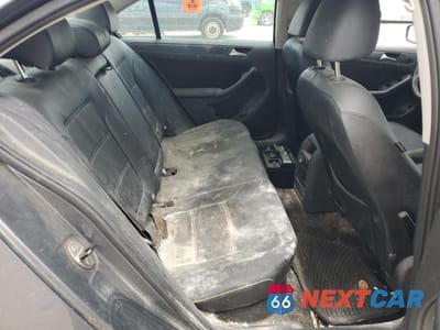 Zdjęcie 10 z 12 samochodu: 2005 VOLKSWAGEN JETTA SE VIN:3VWB07AJ6EM415835 - miniatura