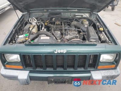 Zdjęcie 11 z 12 samochodu: 2000 JEEP CHEROKEE SPORT VIN:1J4FF48S9YL264540 - miniatura