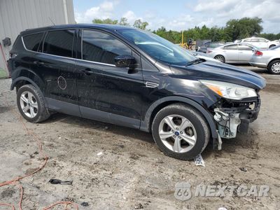 Czwarte zdjęcie samochodu z boku: 2016 FORD ESCAPE SE VIN:1FMCU0G77GUA04369 - miniatura