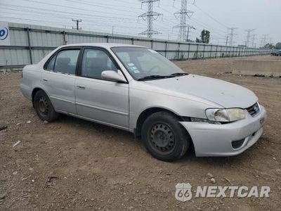 Czwarte zdjęcie samochodu z boku: 2001 TOYOTA COROLLA CE VIN:2T1BR12E21C434375 - miniatura