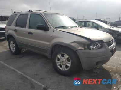Czwarte zdjęcie samochodu z boku: 2001 FORD ESCAPE XLT VIN:1FMYU03181KE78292 - miniatura