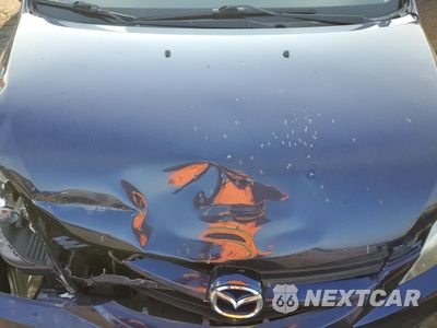 Zdjęcie 12 z 13 samochodu: 2010 MAZDA 5 VIN:JM1CR2WL6A0362304 - miniatura