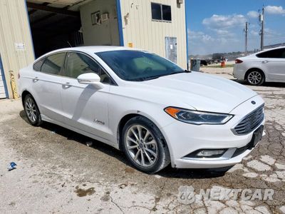 Czwarte zdjęcie samochodu z boku: 2017 FORD FUSION SE HYBRID VIN:3FA6P0LU1HR409002 - miniatura