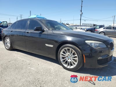 Czwarte zdjęcie samochodu z boku: 2012 BMW 750 LI VIN:WBAKB8C58CC963205 - miniatura