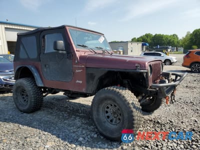 Czwarte zdjęcie samochodu z boku: 1997 JEEP WRANGLER / TJ SE VIN:1J4FY29P2VP412816 - miniatura
