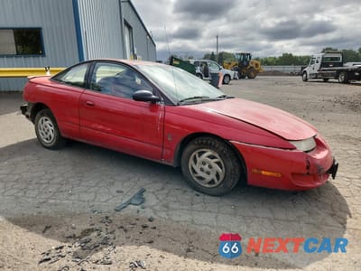 Czwarte zdjęcie samochodu z boku: 1999 SATURN SC1 VIN:1G8ZP1287XZ243932 - miniatura