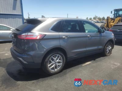 Trzecie zdjęcie samochodu z tyłu: 2022 FORD EDGE SEL VIN:2FMPK4J91NBB05533 - miniatura