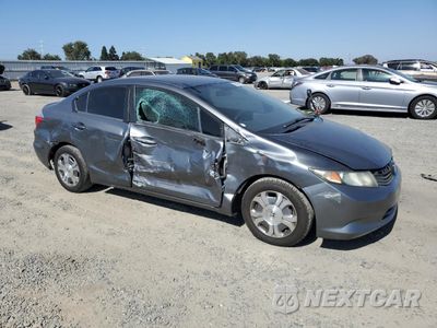 Czwarte zdjęcie samochodu z boku: 2012 HONDA CIVIC HYBRID VIN:JHMFB4F22CS008189 - miniatura