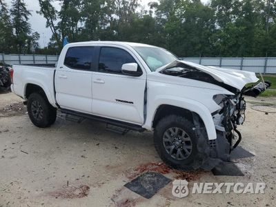 Czwarte zdjęcie samochodu z boku: 2023 TOYOTA TACOMA SR5 V6 VIN:3TMCZ5AN6PM605187 - miniatura