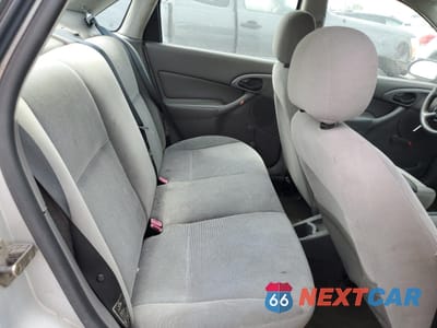 Zdjęcie 10 z 14 samochodu: 2002 FORD FOCUS LX VIN:1FAFP33P72W253645 - miniatura