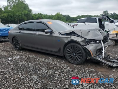 Czwarte zdjęcie samochodu z boku: 2016 BMW 750 XI VIN:WBA7F2C55GG420917 - miniatura