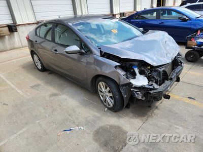 Czwarte zdjęcie samochodu z boku: 2016 KIA FORTE LX VIN:KNAFX4A67G5609175 - miniatura
