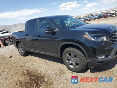 Czwarte zdjęcie samochodu z boku: 2024 HONDA RIDGELINE TRAIL SPORT VIN:5FPYK3F68RB000635 - miniatura