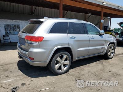 Trzecie zdjęcie samochodu z tyłu: 2014 JEEP GRAND CHEROKEE OVERLAND VIN:1C4RJFCG0EC386442 - miniatura