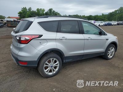 Trzecie zdjęcie samochodu z tyłu: 2018 FORD ESCAPE SE VIN:1FMCU9GD8JUD24947 - miniatura