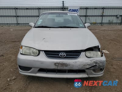 Piąte zdjęcie samochodu w środku: 2001 TOYOTA COROLLA CE VIN:2T1BR12E21C434375 - miniatura