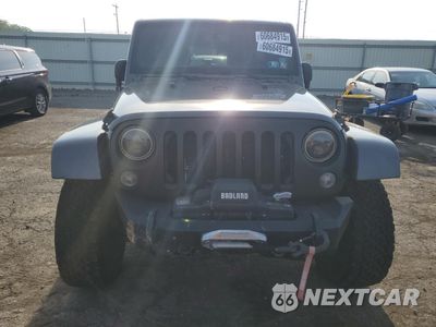 Piąte zdjęcie samochodu w środku: 2014 JEEP WRANGLER UNLIMITED SAHARA VIN:1C4HJWEG9EL240338 - miniatura