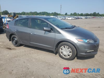 Czwarte zdjęcie samochodu z boku: 2010 HONDA INSIGHT LX VIN:JHMZE2H5XAS013511 - miniatura